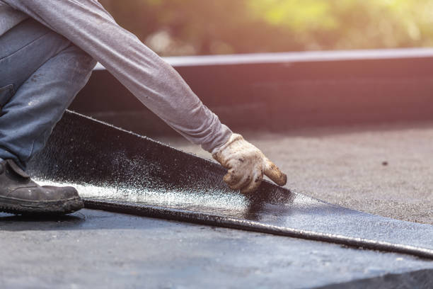 Professional Waterproofing technician working in East Liberty, OH